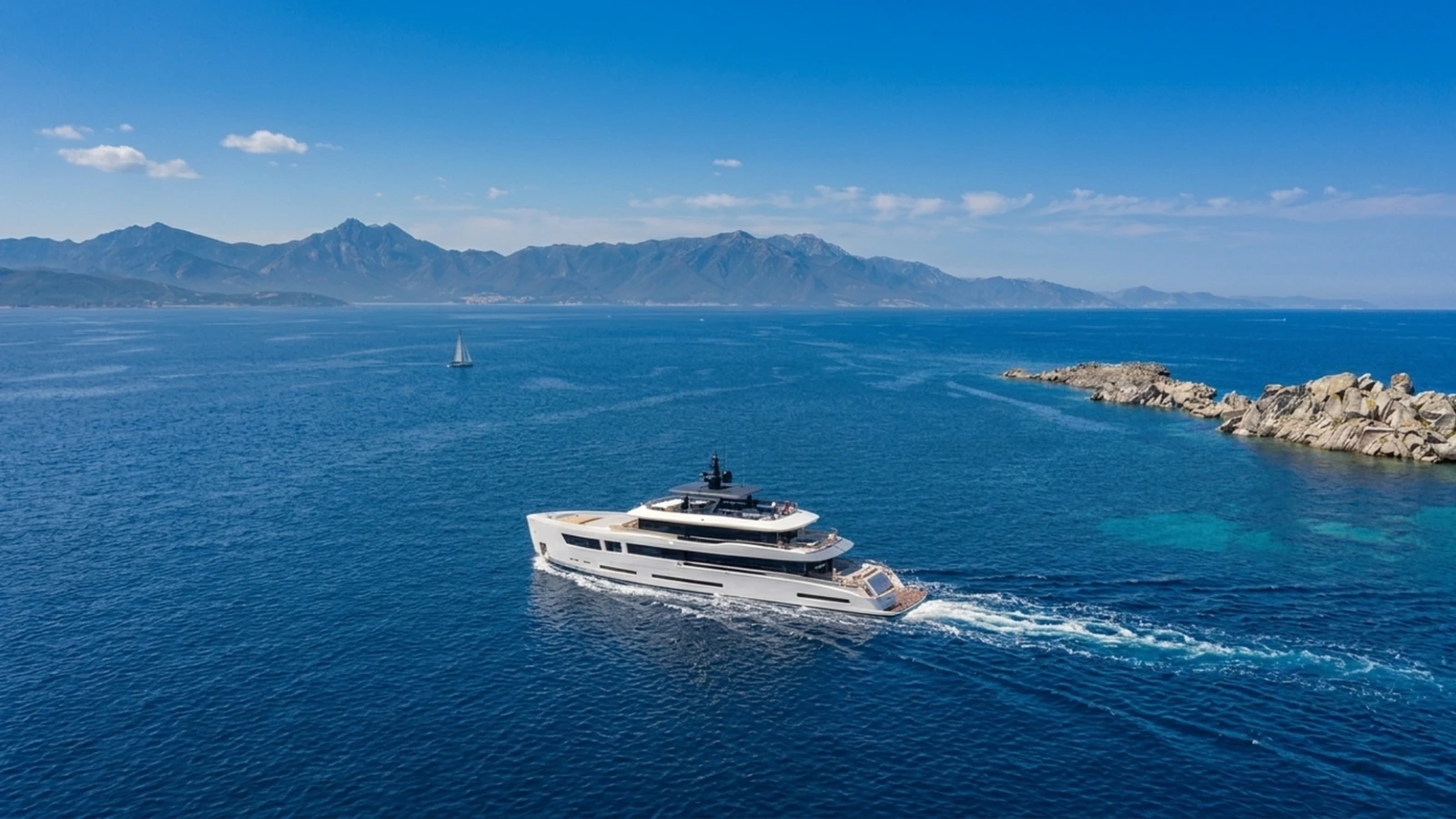 A superyacht photographed in open coastal water